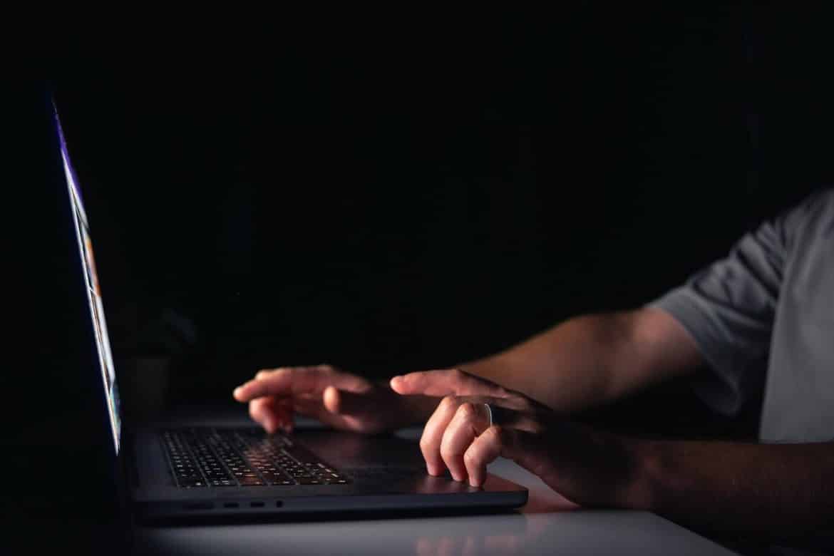 young-man-works-computer-night_169016-62523 dark web monitoring services in malaysia